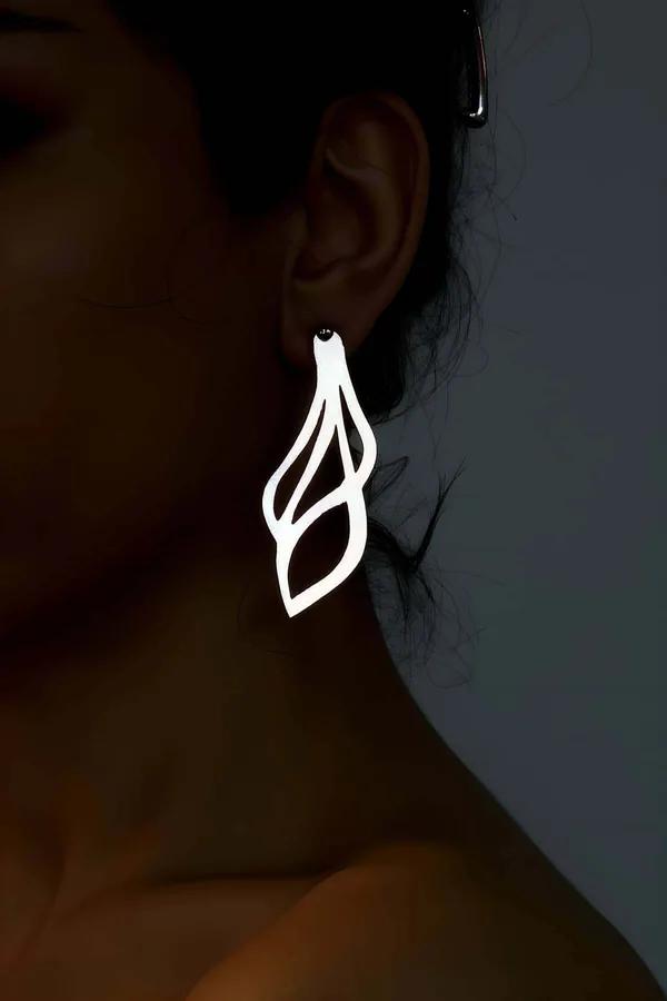 Reflective Laser-Cut Dangle Earrings with Abstract Swirl