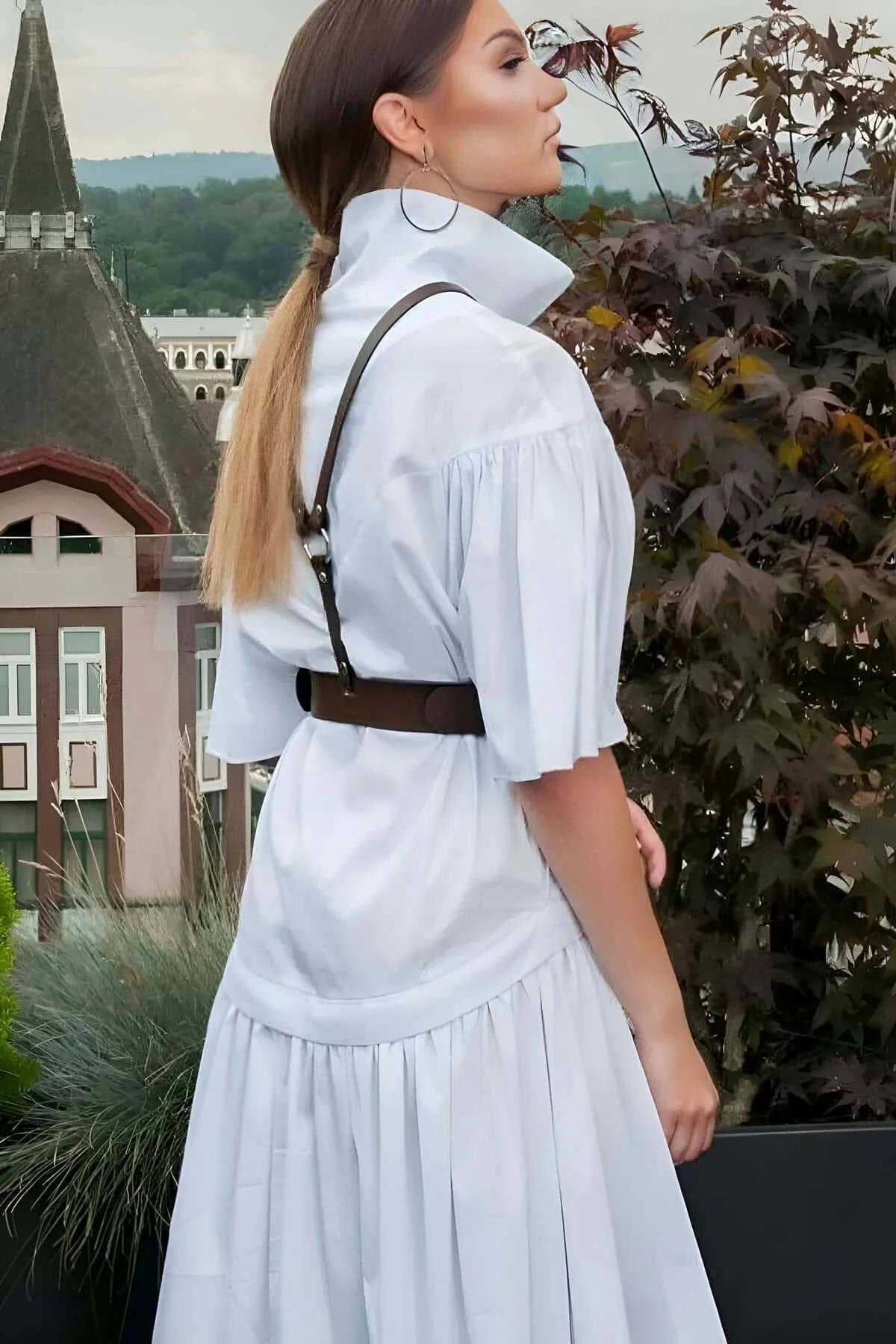 Espresso faux leather Y-strap chest harness with adjustable silver buckles close-up detail