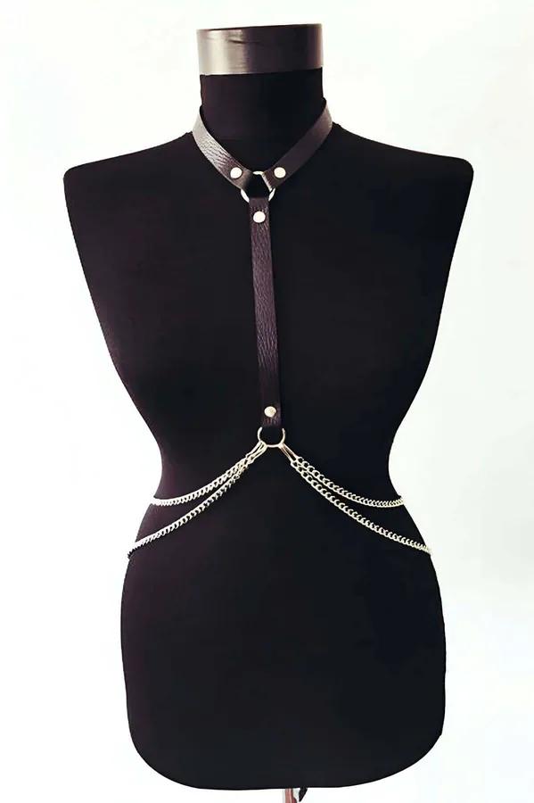 black vegan leather choker harness with gold dual chain body accessory on model