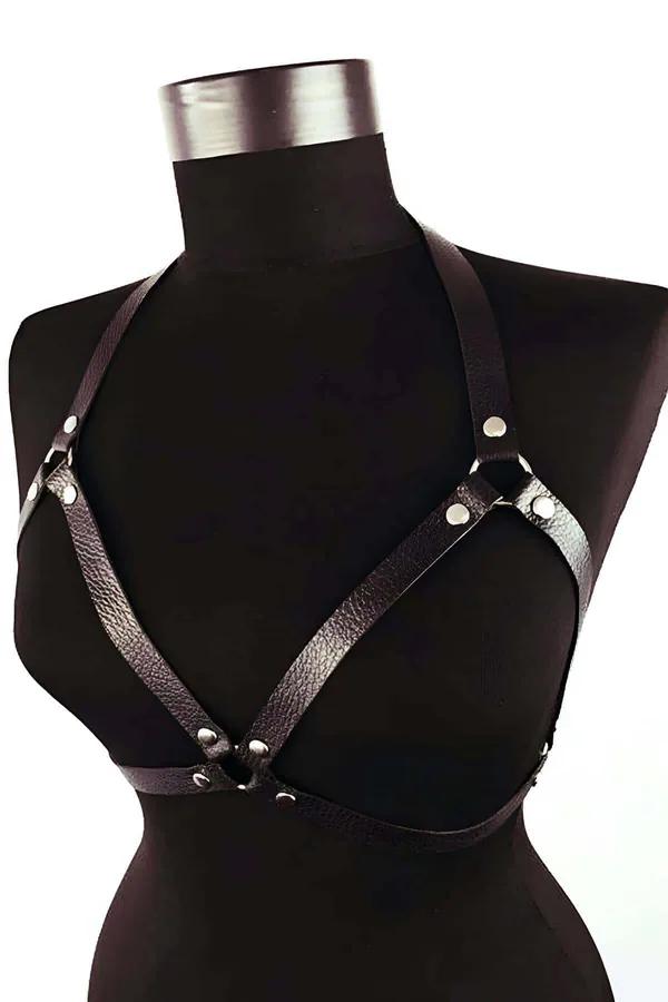 black faux leather chest harness triangle cut with silver snap on female model