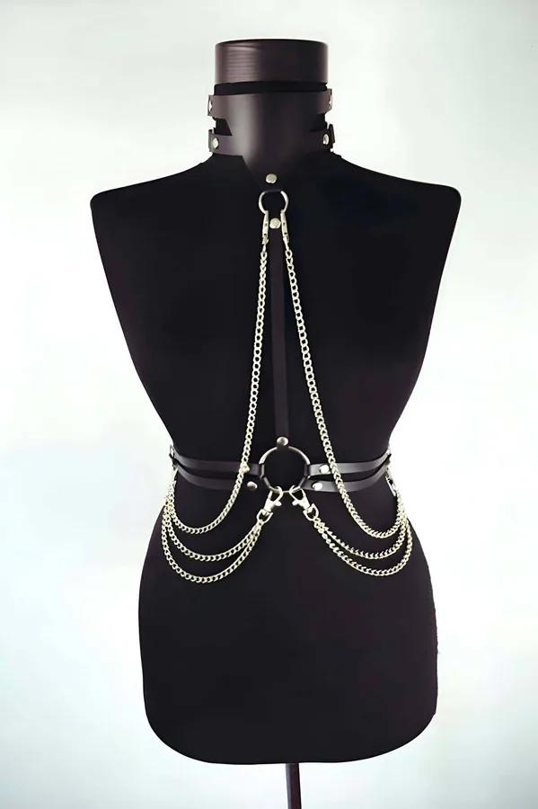 black vegan leather waist harness with gold chain drape necklace collar O-ring detail on model