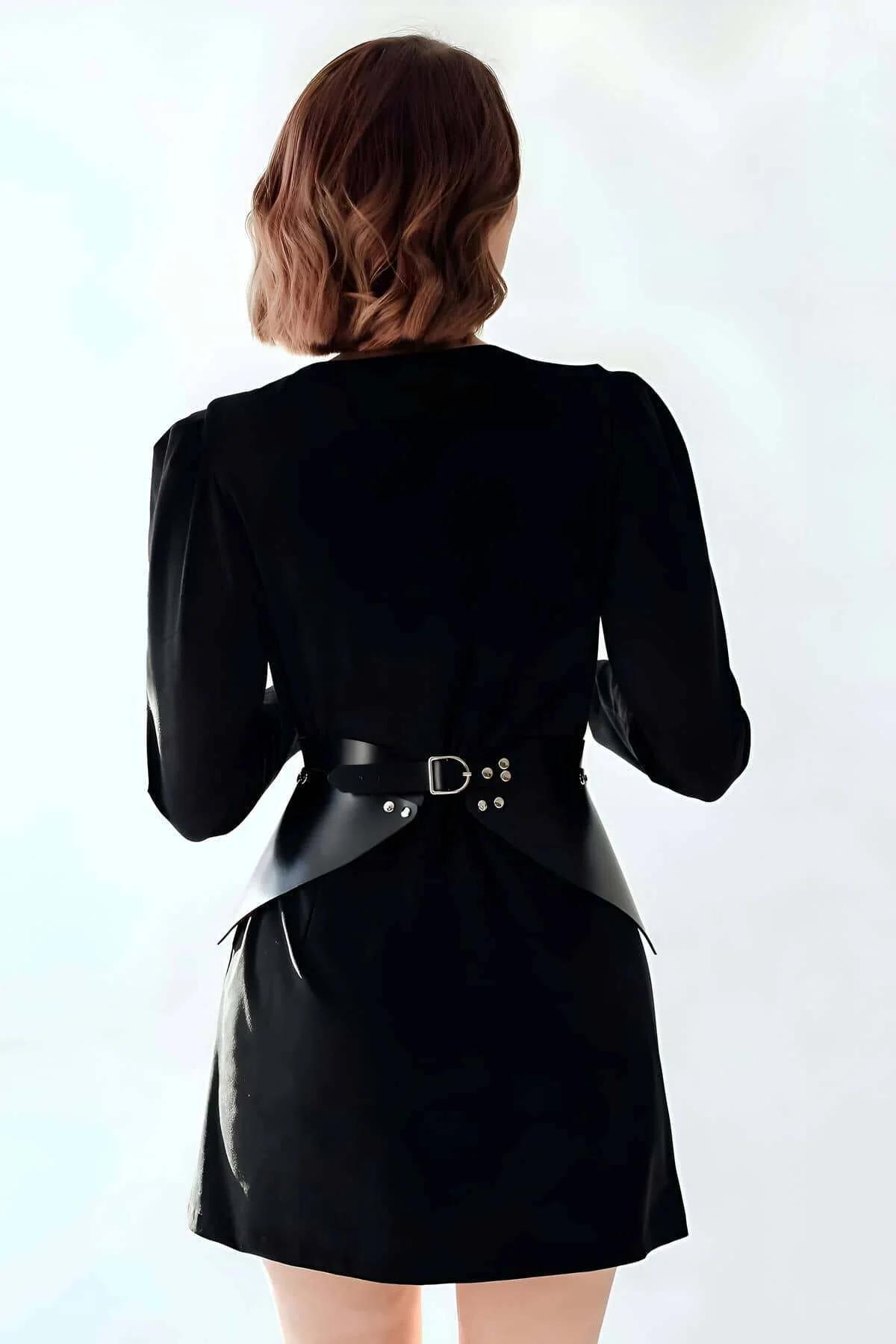 black wide waist belt worn over fitted dress highlighting hourglass silhouette