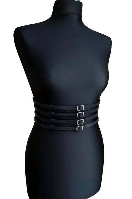 close-up of silver rectangular buckles on black vegan leather waspie belt straps