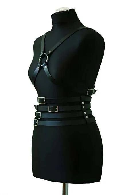 black faux leather body harness with O-ring chest and four silver buckle waist straps on mannequin
