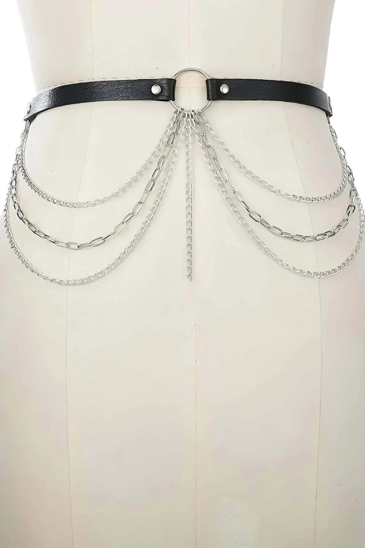 Side view of black vegan leather waist harness showing cascading chain drape length on mannequin