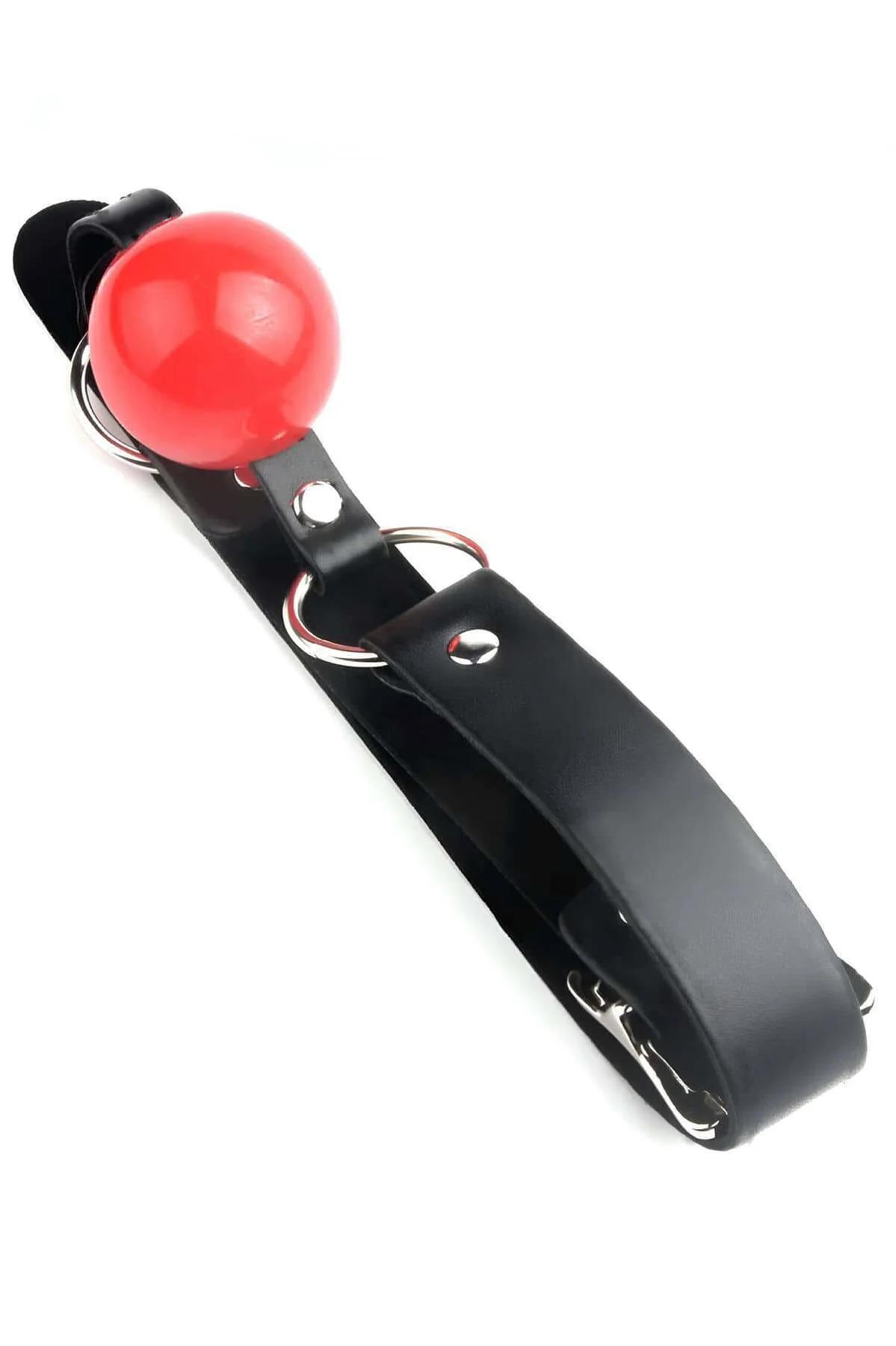 black vegan leather ball gag strap laid flat showing multi-hole buckle and silver hardware detail