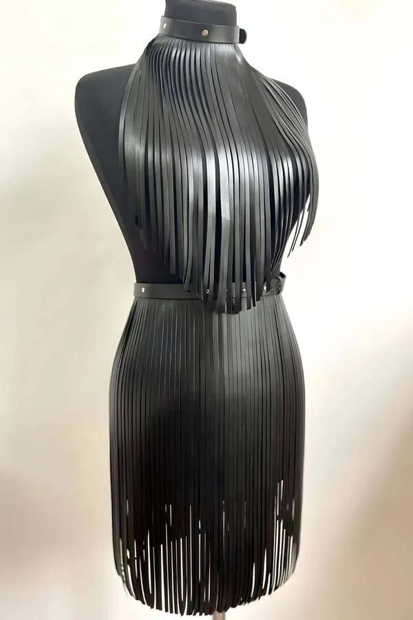 Black faux leather fringe halter top and mini skirt set with choker collar and adjustable waist belt on mannequin