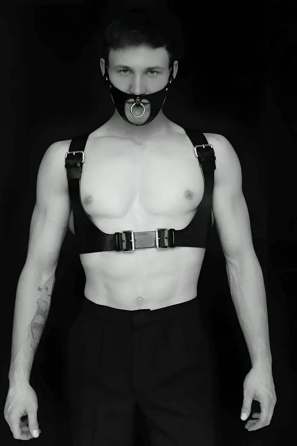 Black faux leather mens body harness with detachable silver O-ring gag mask and dual buckle chest band