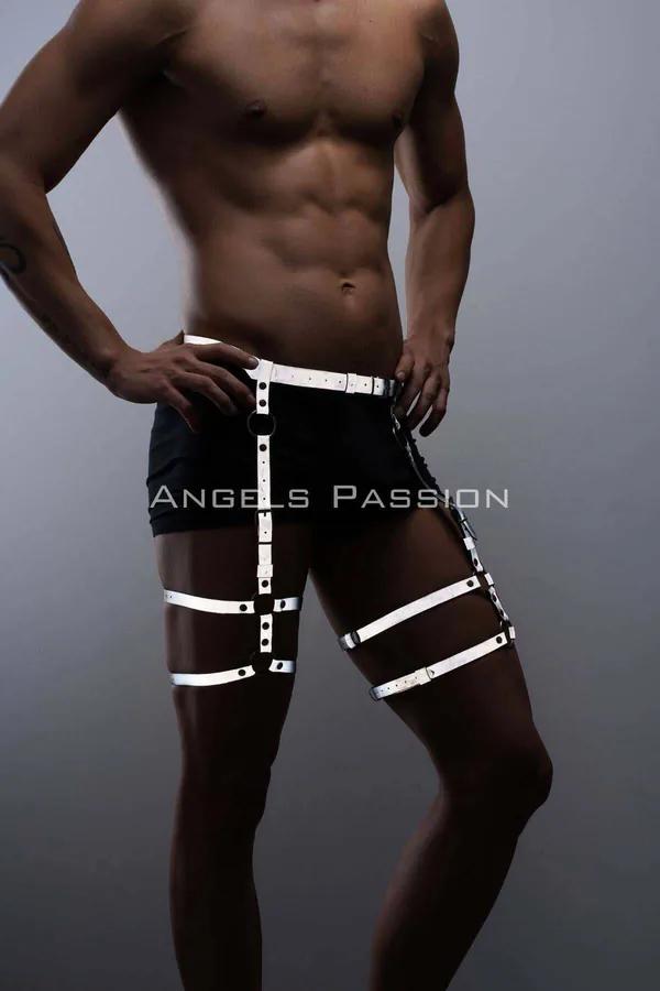 reflective white vegan leather men's leg harness garter, worn over black boxers, thigh and waist band view
