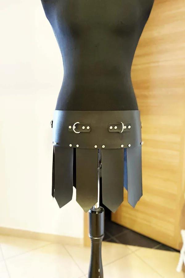 black vegan leather gladiator skirt silver D-buckle and rivet waist band rectangular strap panels
