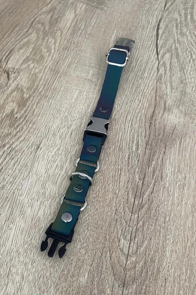 Close-up of rainbow iridescent PU faux leather band showing blue yellow green pink color shift