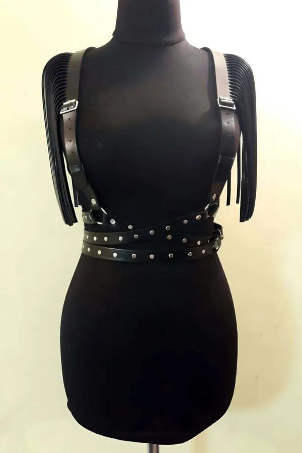 black faux leather fringe shoulder chest harness with double silver-studded waist bands on mannequin