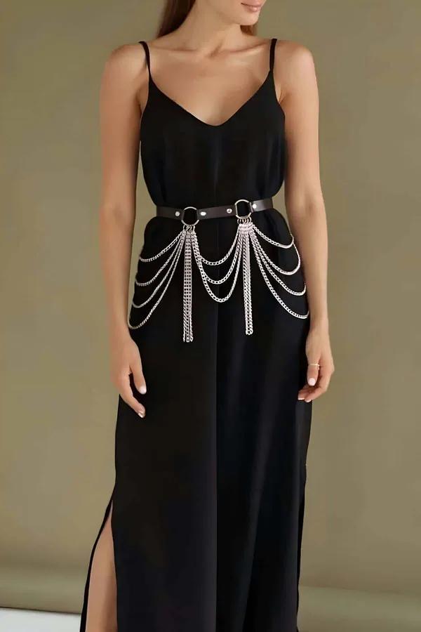 Black faux leather chain belt harness with cascading silver curb-link strands hanging from twin O-rings at the waist