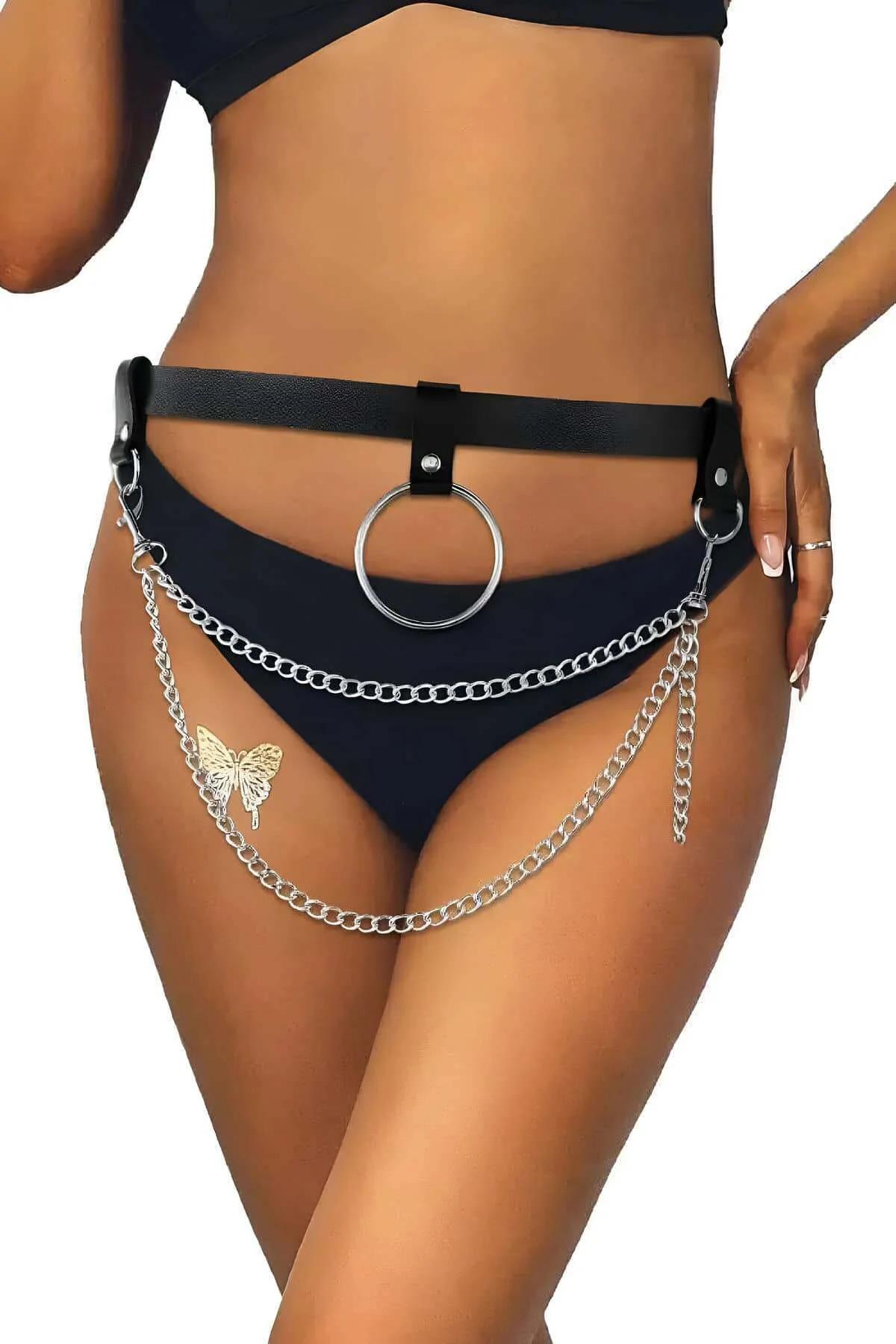 Black faux leather waist belt with silver O-ring draped chains and gold butterfly charm worn at hip